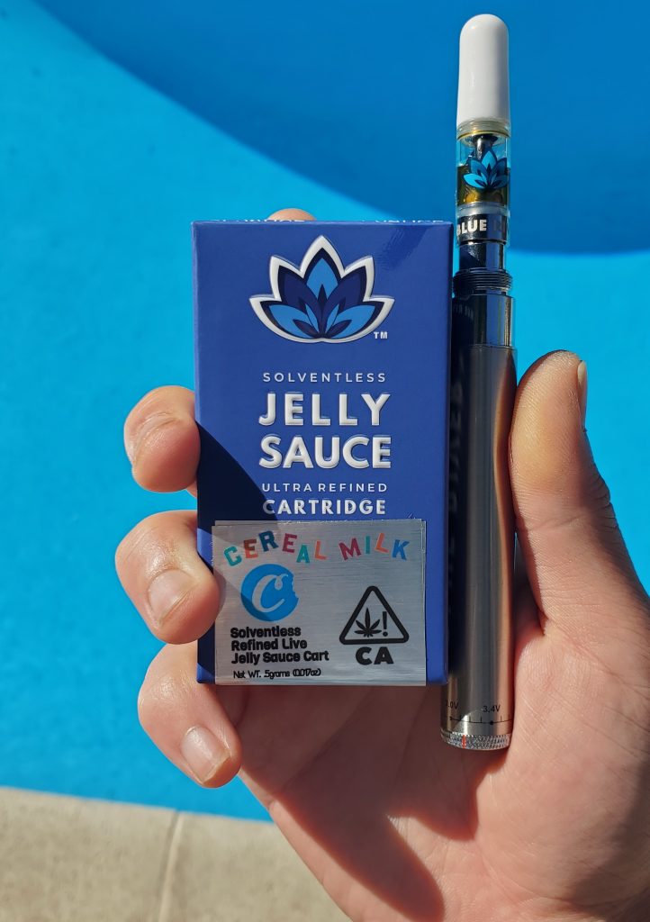 blue river jelly sauce cart in hand